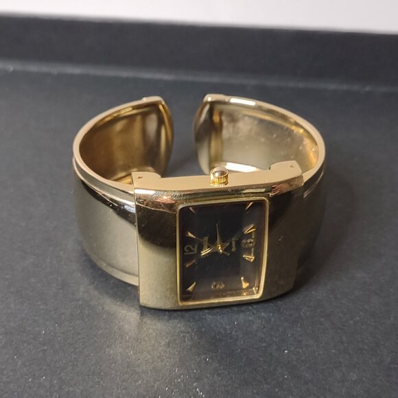 Small 5.5 Inch Xanadu Gold Tone Cuff Watch - Picture 9 of 10